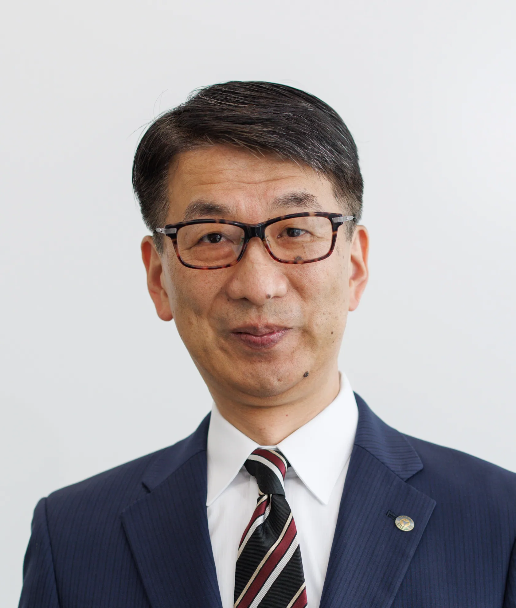 写真：代表取締役社長 村井 健二